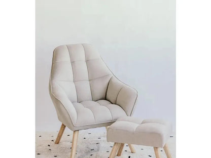 Beige upholstered armchair with matching footstool, both featuring wooden legs.