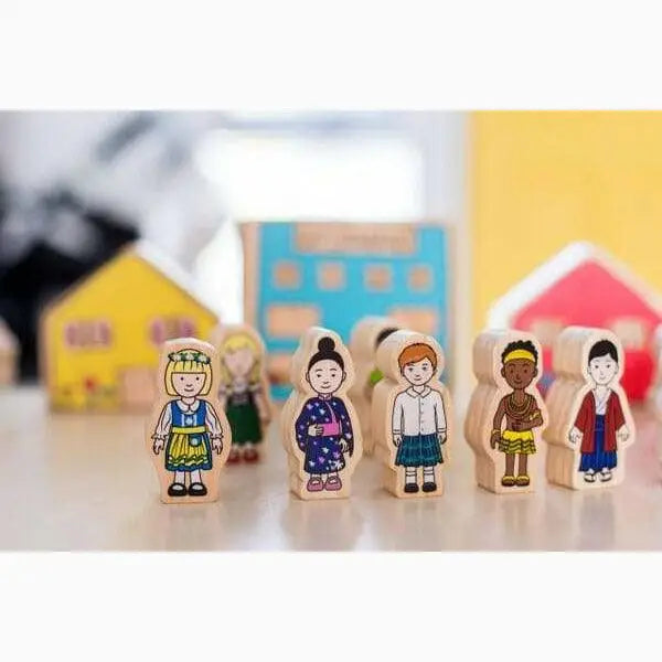 Wooden toy figures representing diverse children from different cultures.