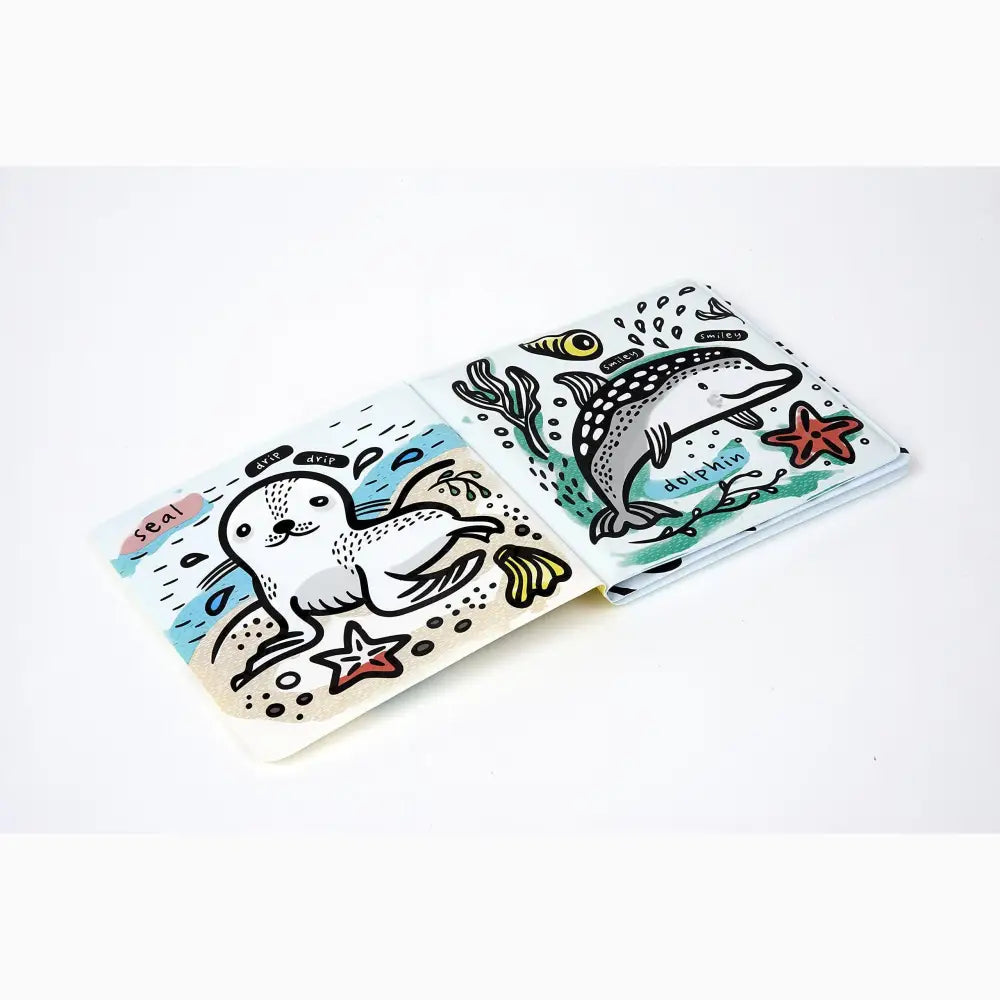 Illustrated phone case featuring marine life designs like a seal and dolphin.