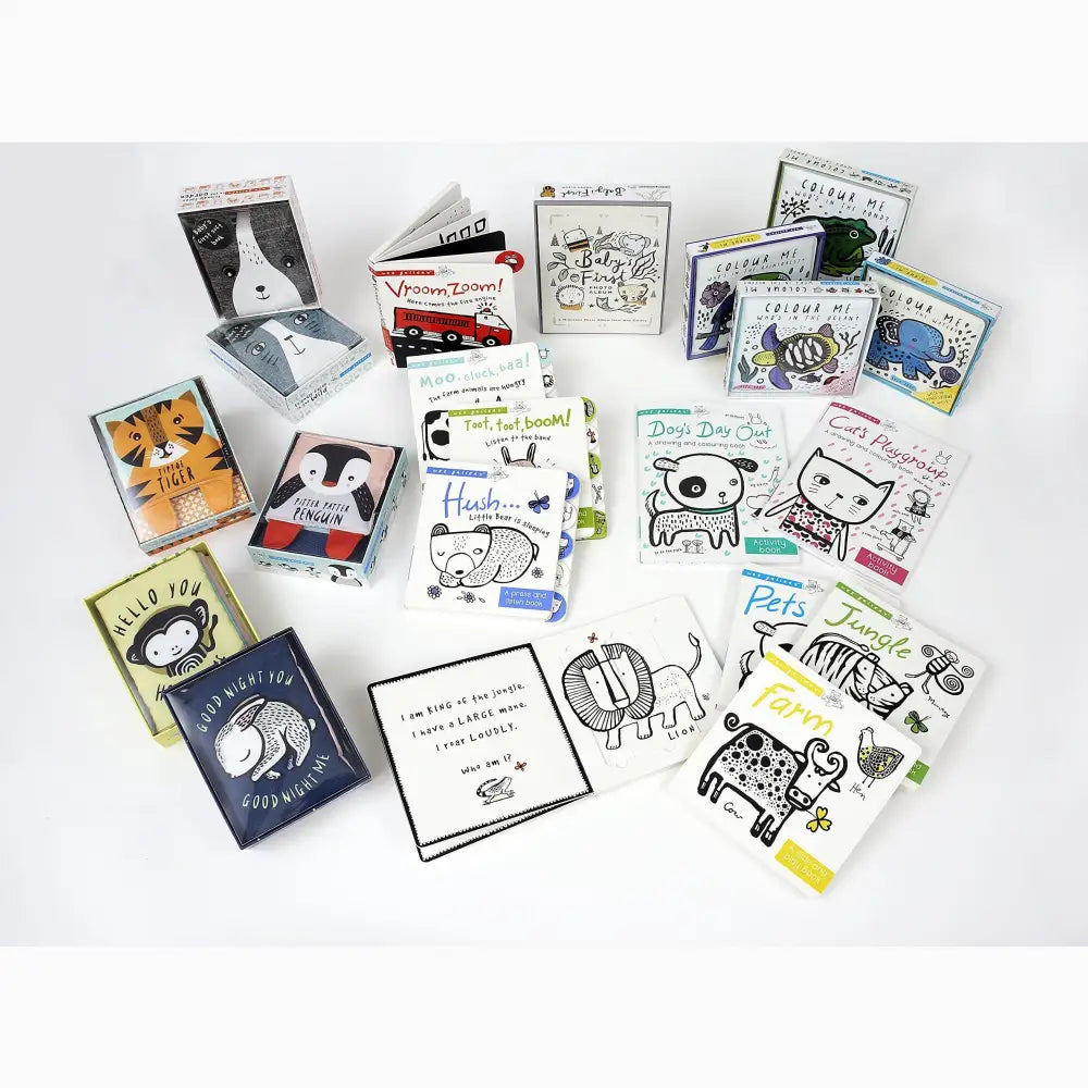 Collection of children’s books and illustrated cards featuring animal characters.