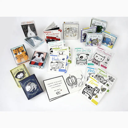 Collection of children’s books and illustrated cards featuring animal characters.