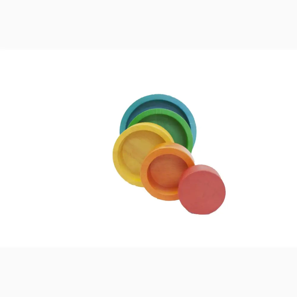 Set of colorful nested circular plates or discs in rainbow hues.