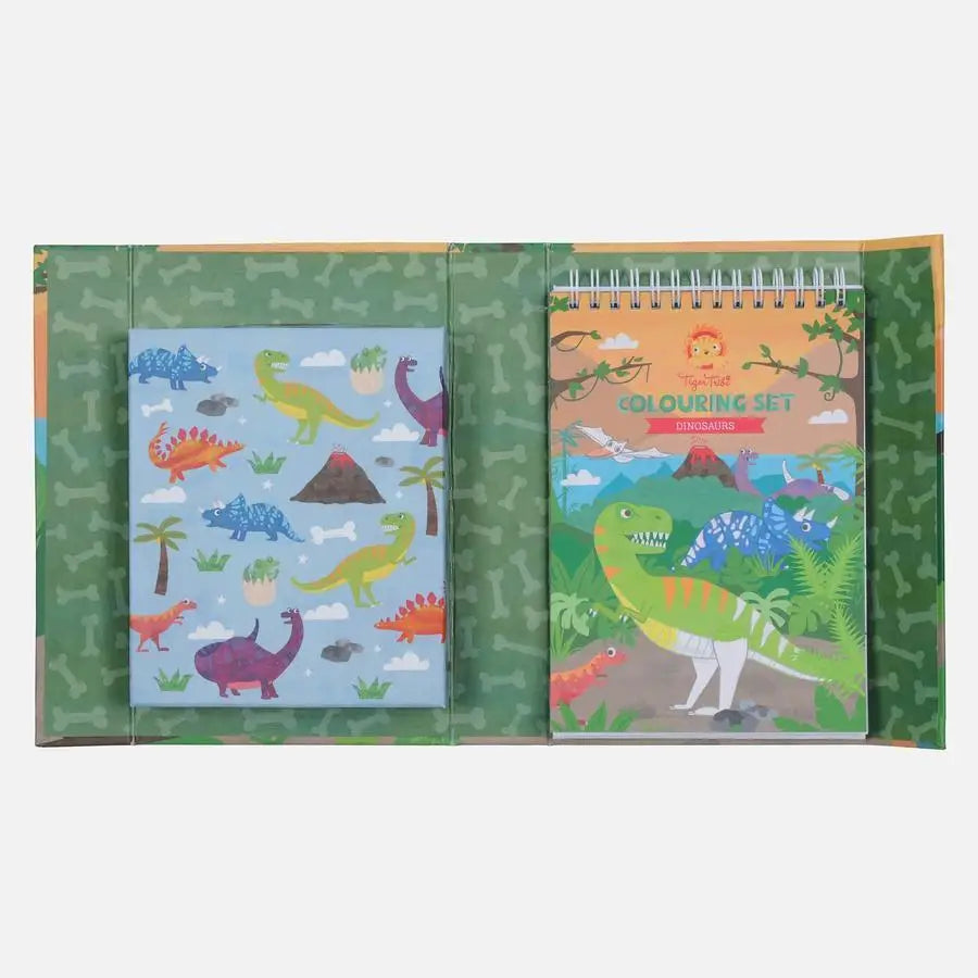 Dinosaur-themed notebook and folder set with colorful illustrations.