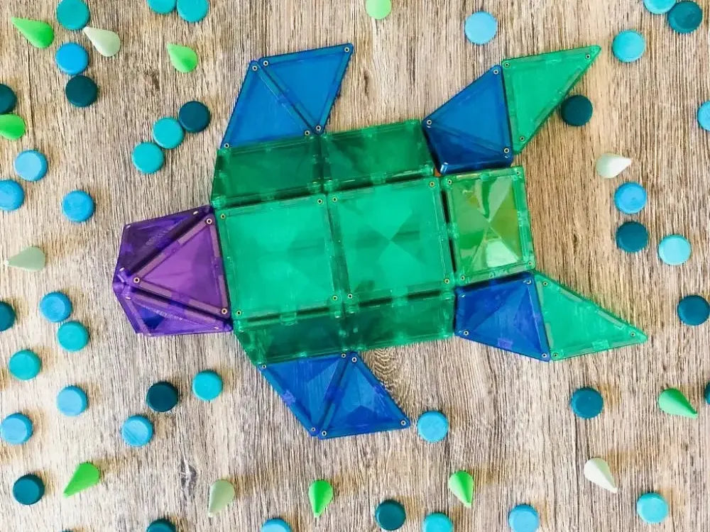 Colorful geometric fish shape made of translucent plastic pieces.