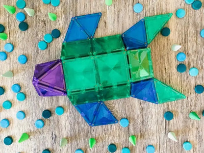 Colorful geometric fish shape made of translucent plastic pieces.