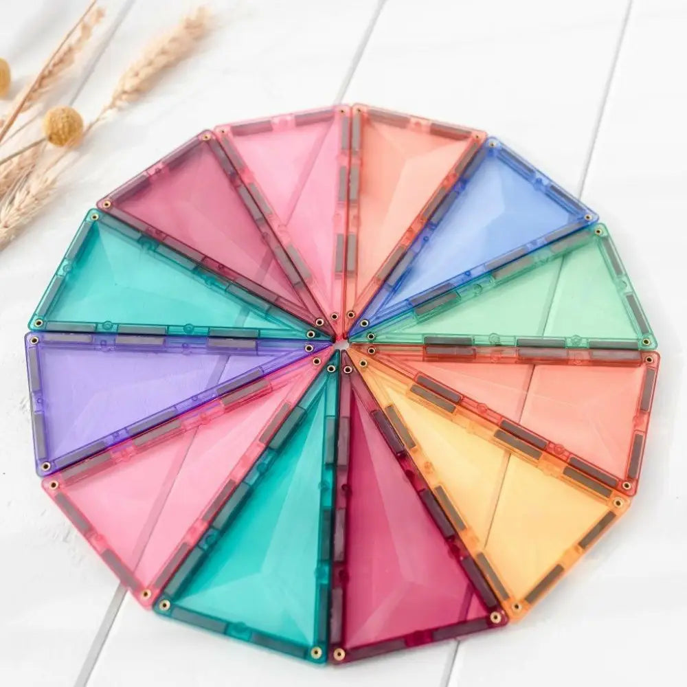 Circular arrangement of colorful triangular magnetic tiles forming a wheel-like shape.