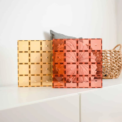 Colorful acrylic or glass grid panels in shades of yellow, orange, and pink.