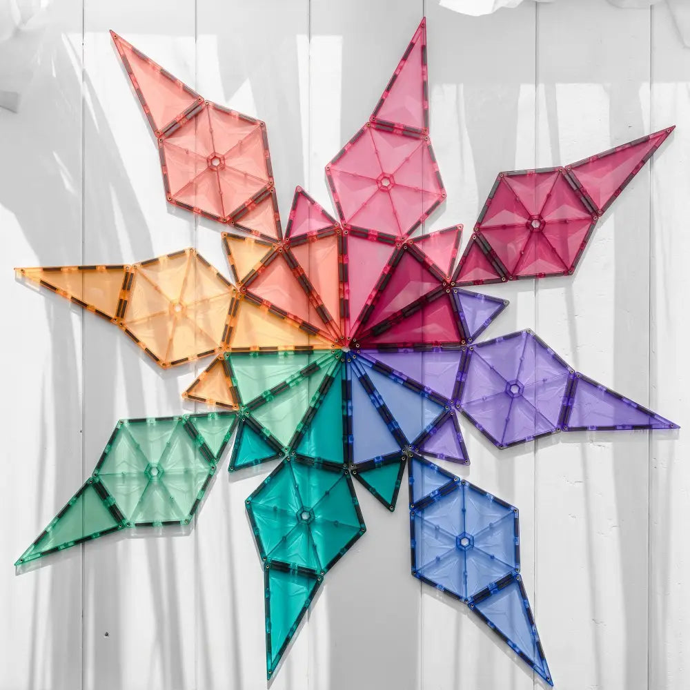 Colorful geometric star-shaped design made of folded paper triangles arranged in a circular pattern.