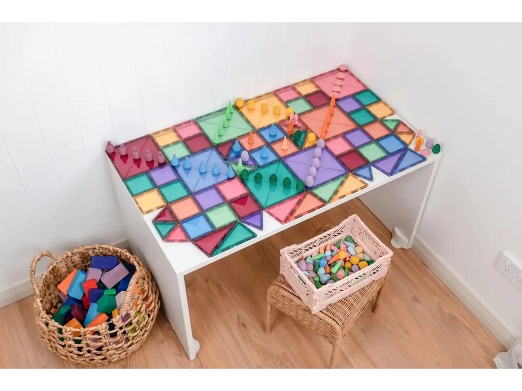 Colorful table with a geometric pattern painted on its surface.