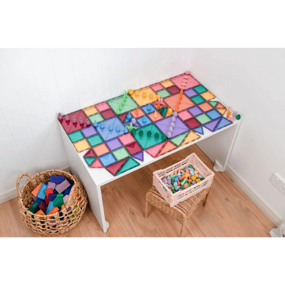 Colorful table with a geometric pattern painted on its surface.