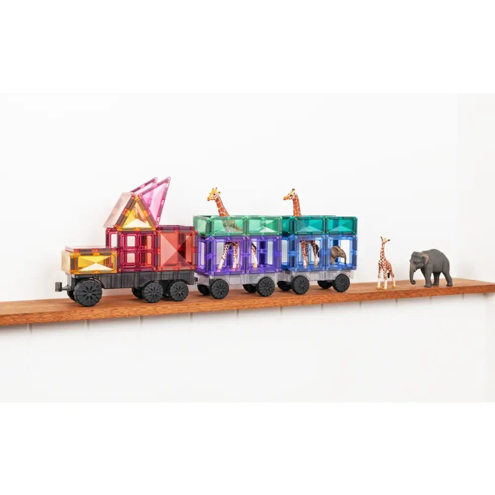 Colorful toy train with animal-themed cars carrying a giraffe and elephant figurine.