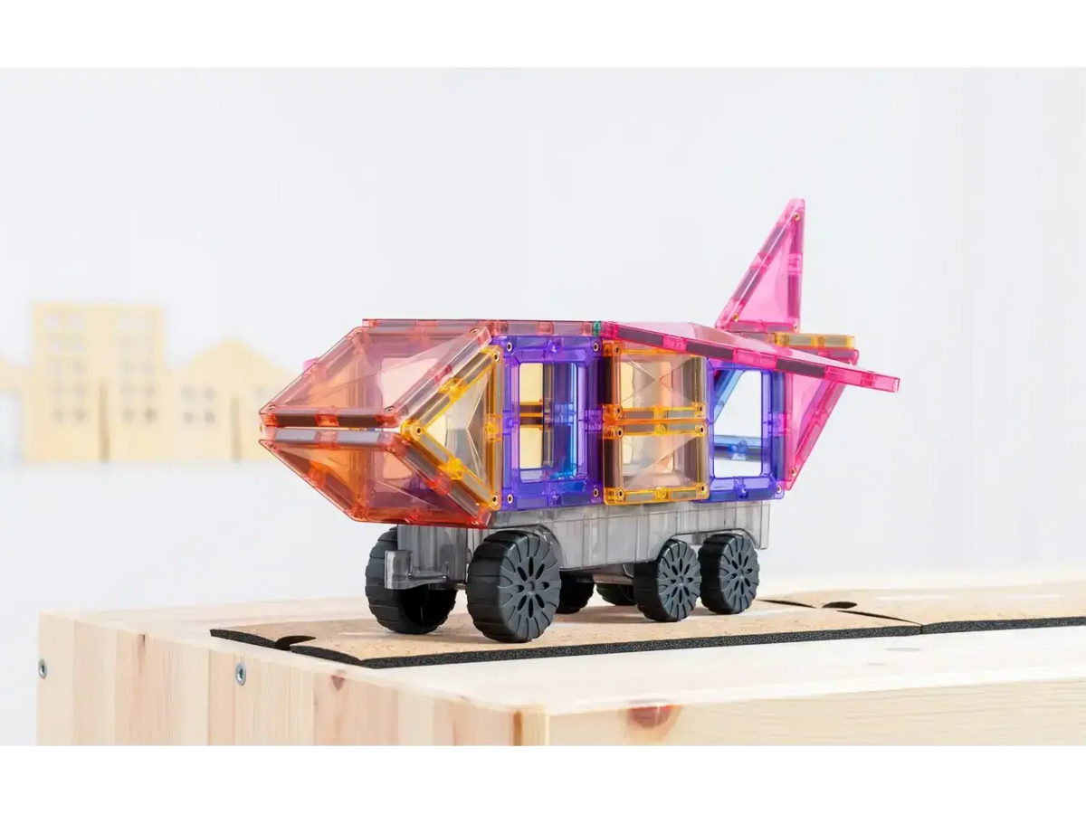 Colorful wooden toy wagon or cart with geometric shapes and wheels.