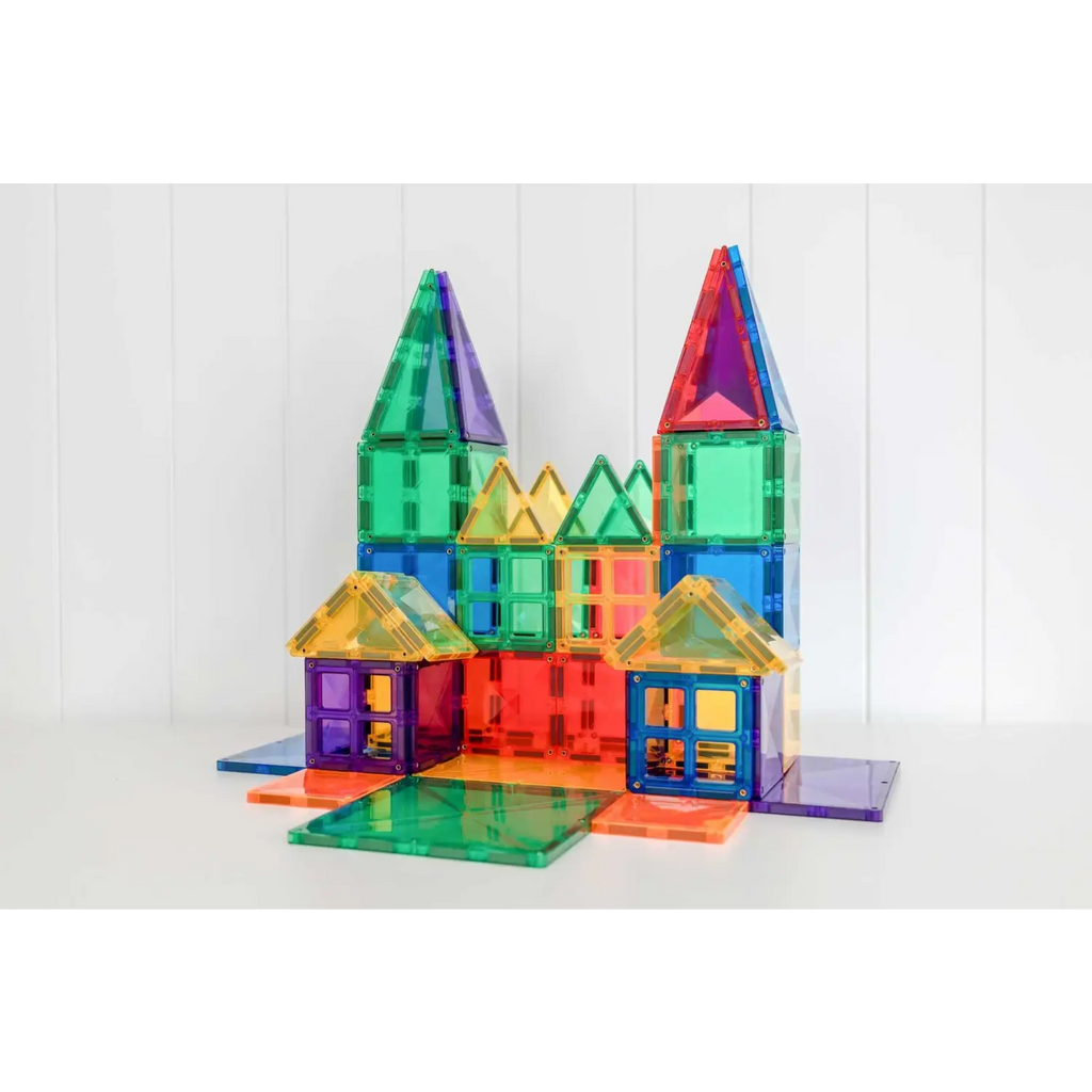 Colorful magnetic building tiles assembled into a castle-like structure.