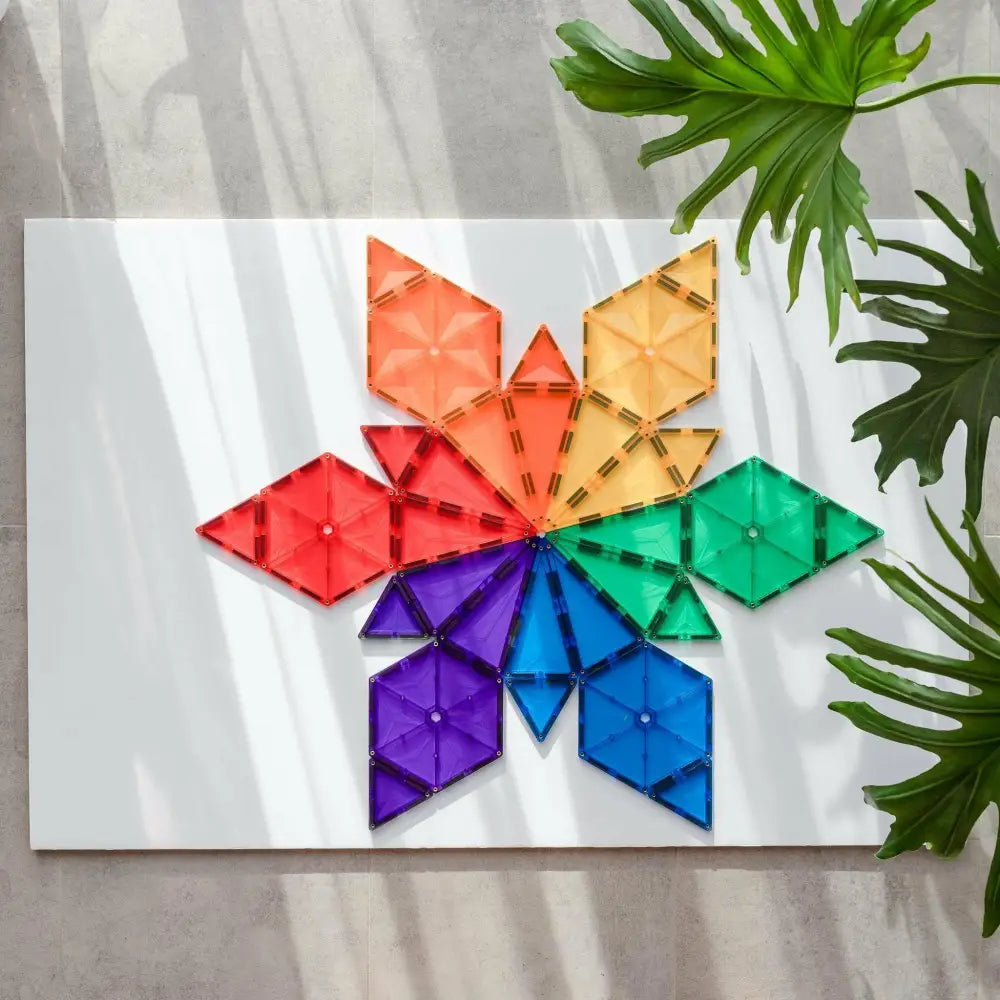 Colorful geometric star shape made of triangular pieces arranged in a rainbow pattern.