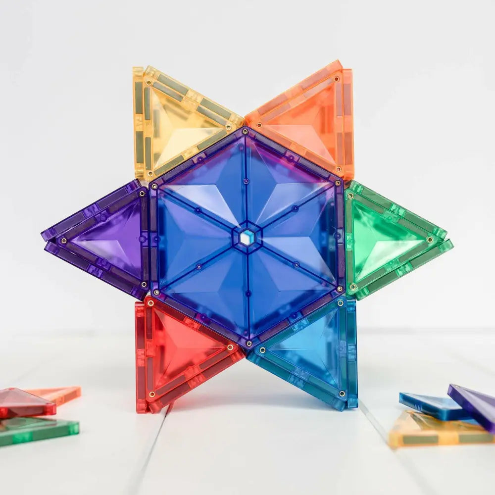 Colorful star-shaped construction made of translucent plastic triangular pieces.