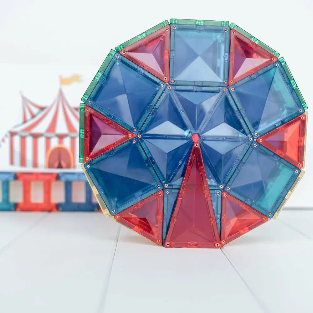 Colorful geometric structure made of triangular and square magnetic tiles.