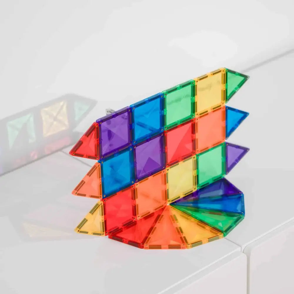 Colorful geometric construction toy made of translucent plastic triangular pieces.