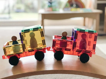 Colorful magnetic toy train with figurine passengers.