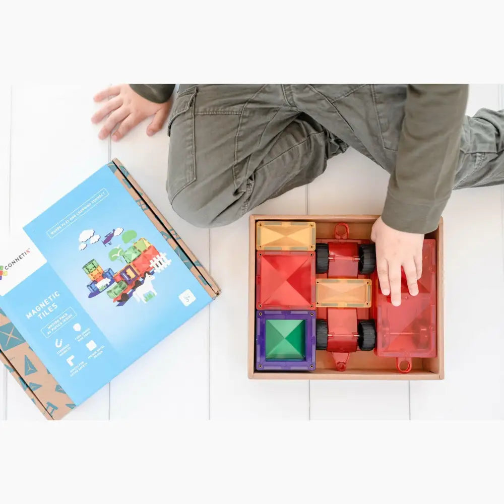 Wooden puzzle box with colorful geometric shapes and blocks.