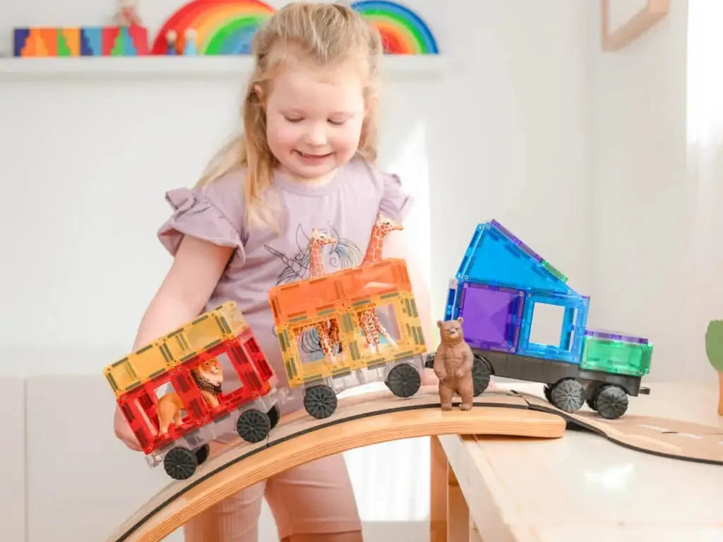Colorful wooden toy train on a curved track.
