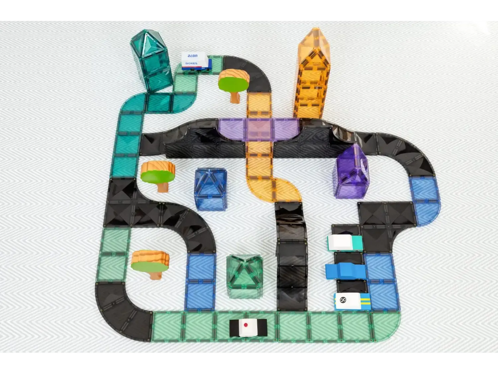 Colorful toy road or track system with various interconnected paths and blocks.