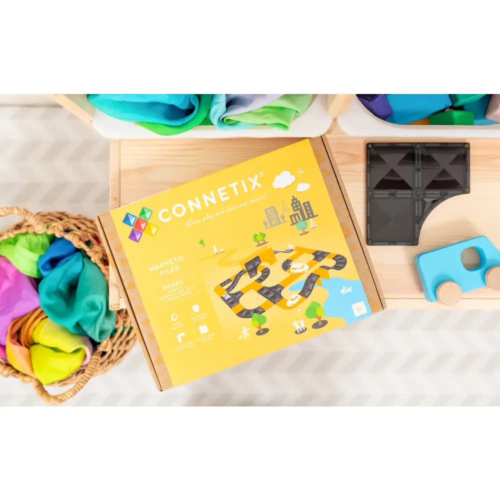 Yellow board game box labeled ’Connetix’ with colorful geometric shapes on the cover.