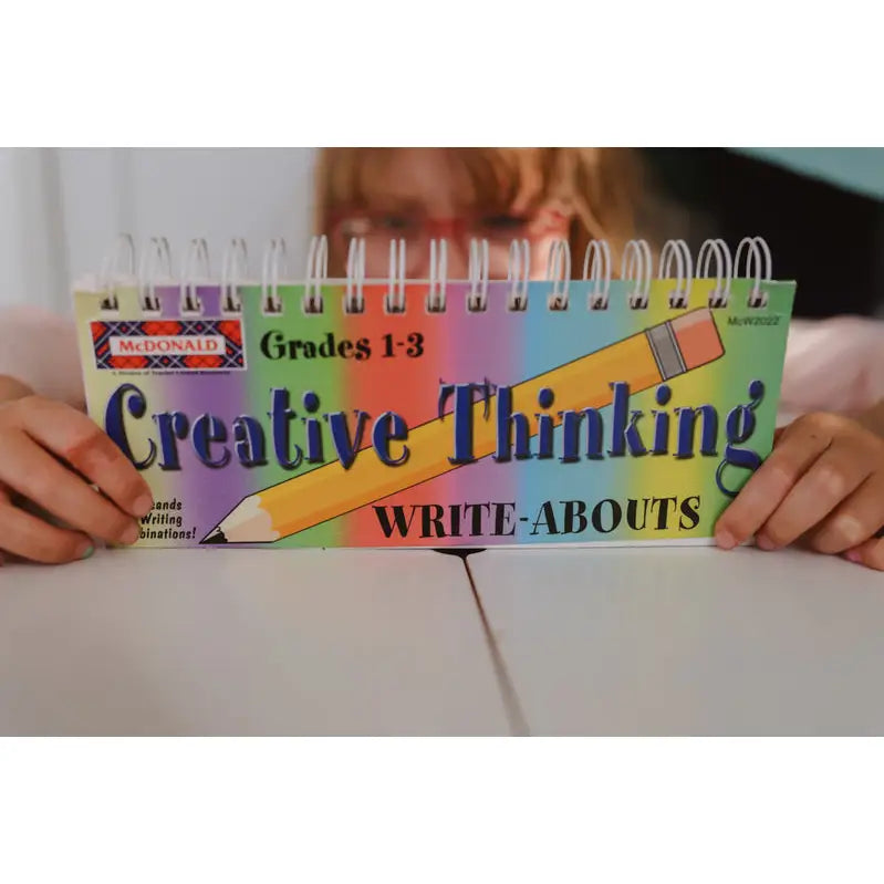 Spiral-bound book titled ’Creative Thinking Write-Abouts’ for grades 1-3.