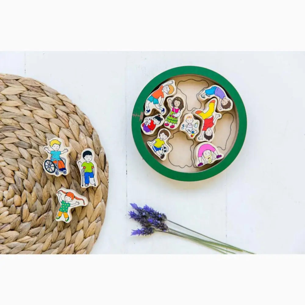 Circular green tray containing colorful cartoon character puzzle pieces.