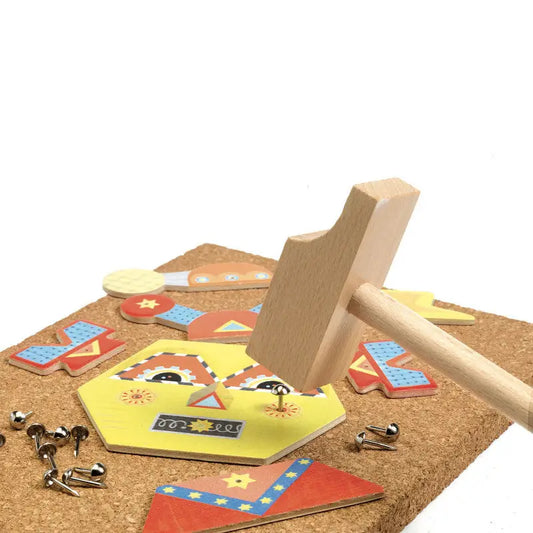 Wooden hammer toy with geometric shapes.