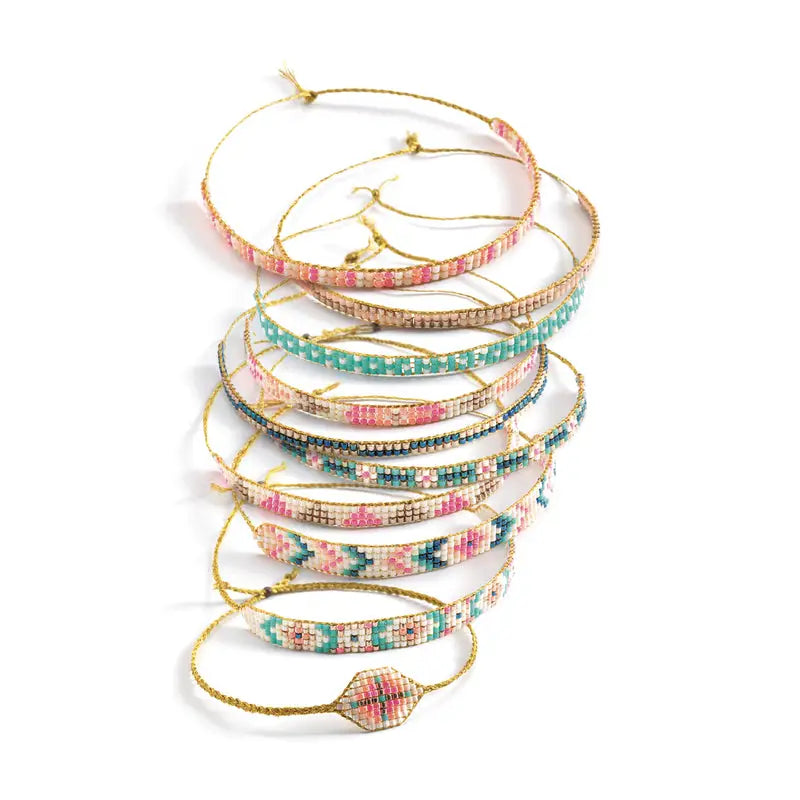 Stack of colorful beaded bracelets.