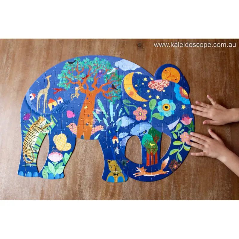 Colorful elephant-shaped puzzle with whimsical nature-themed illustrations covering its surface.