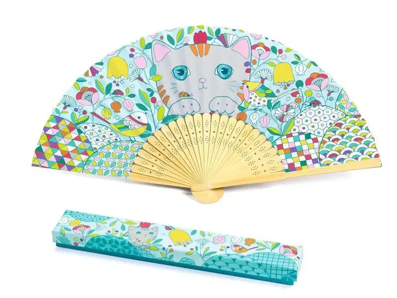 Colorful folding hand fan with a cat face and whimsical patterns, accompanied by a matching case.