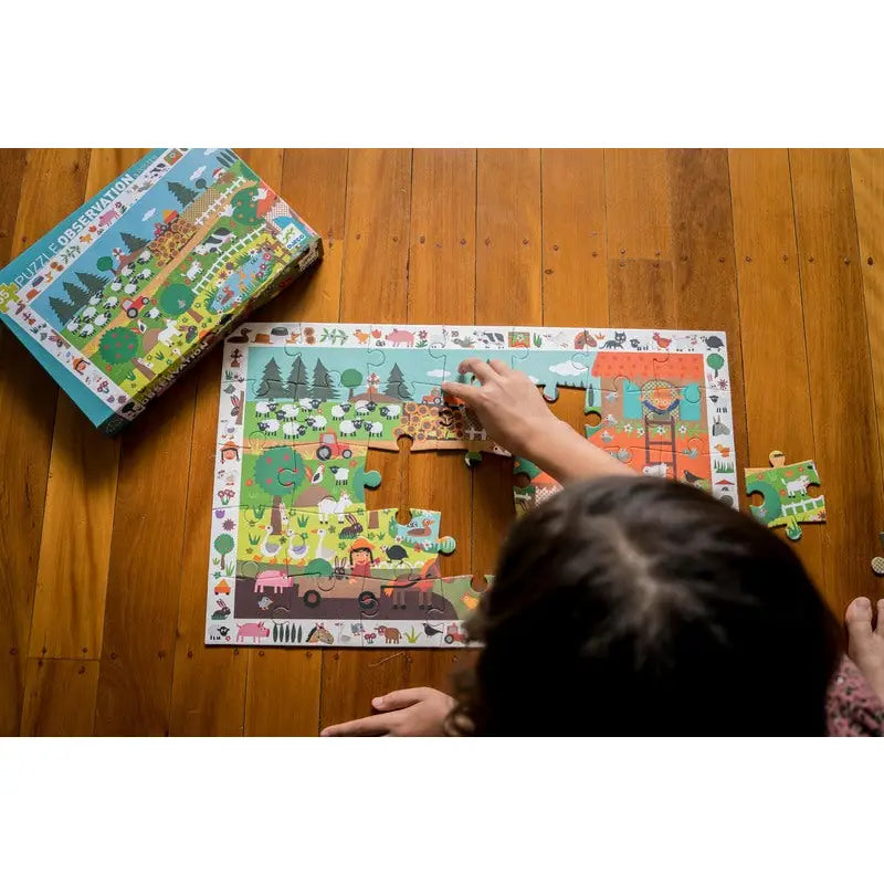 Colorful children’s puzzle being assembled on a wooden floor.