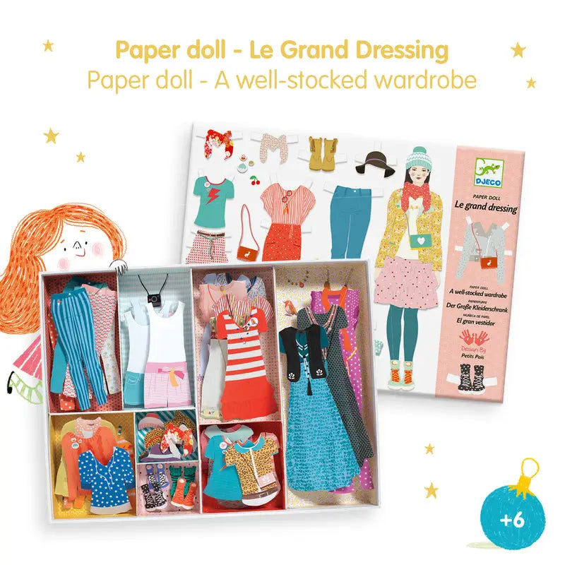 Paper doll set with various outfits and accessories in a colorful box.