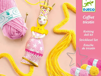 Knitting doll kit with pink and yellow yarn and a decorative doll-shaped knitting tool.