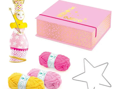 Pink gift box with gold polka dot pattern and ’Knit’ text on top.
