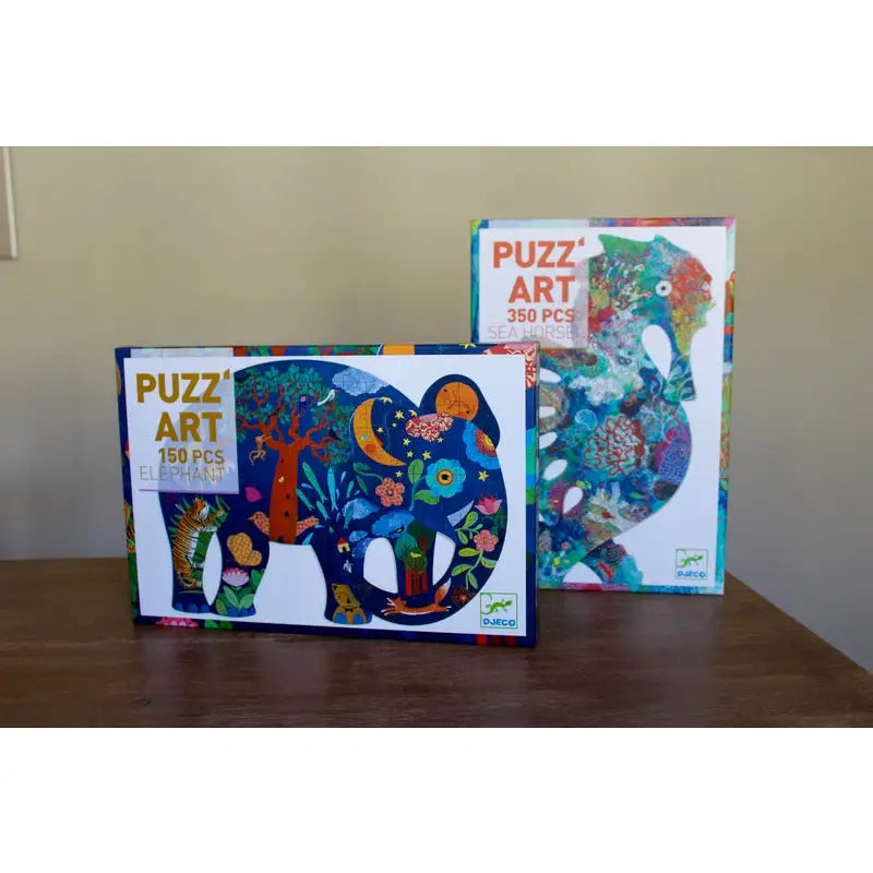 Two colorful puzzle boxes featuring whimsical animal designs.