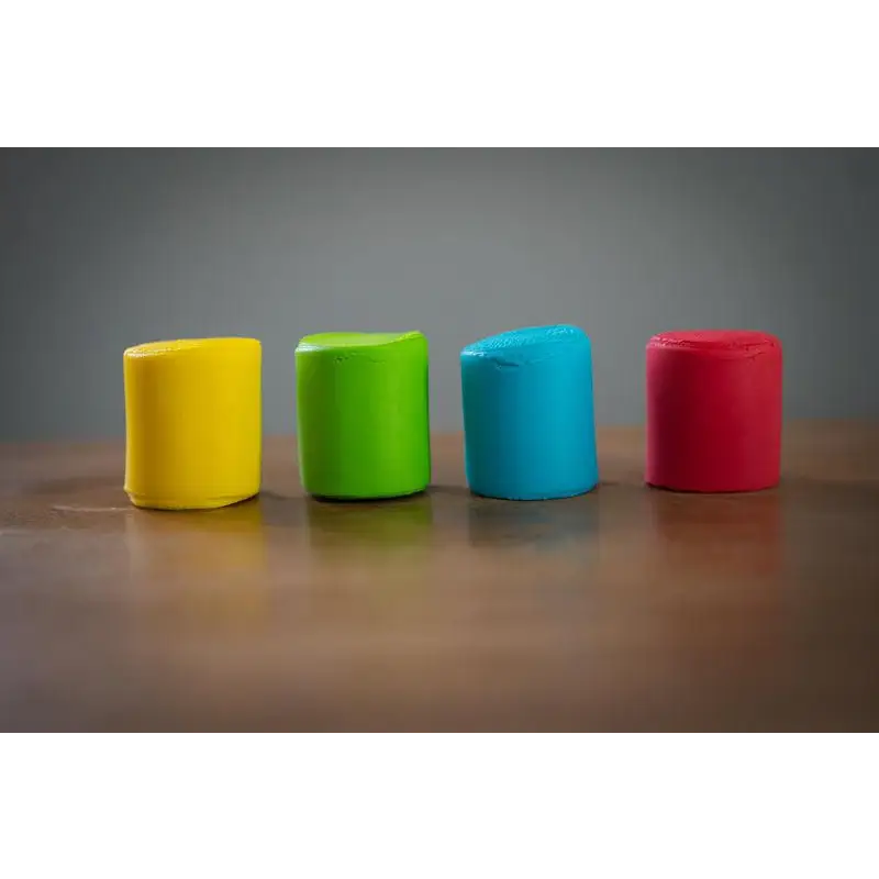 Four colorful cylindrical objects arranged in a row.