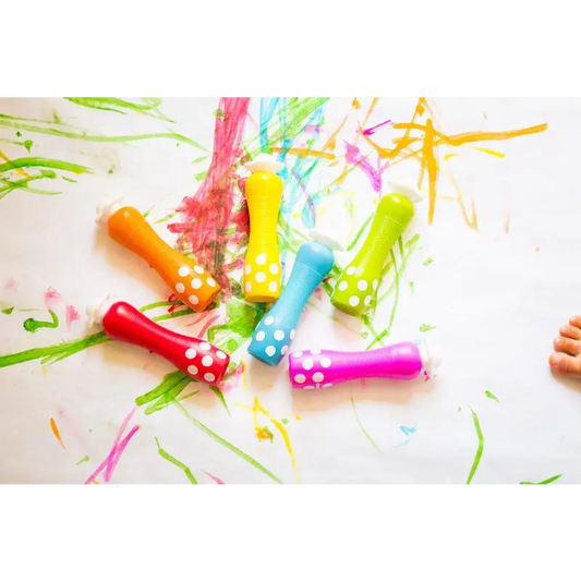 Colorful party horns or noisemakers with polka dot patterns.