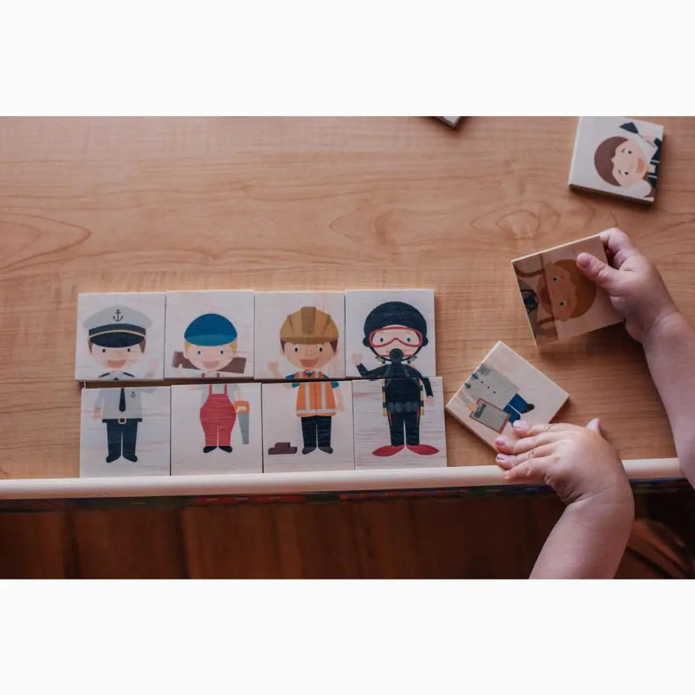 Wooden puzzle featuring cartoon occupations with interchangeable body parts.