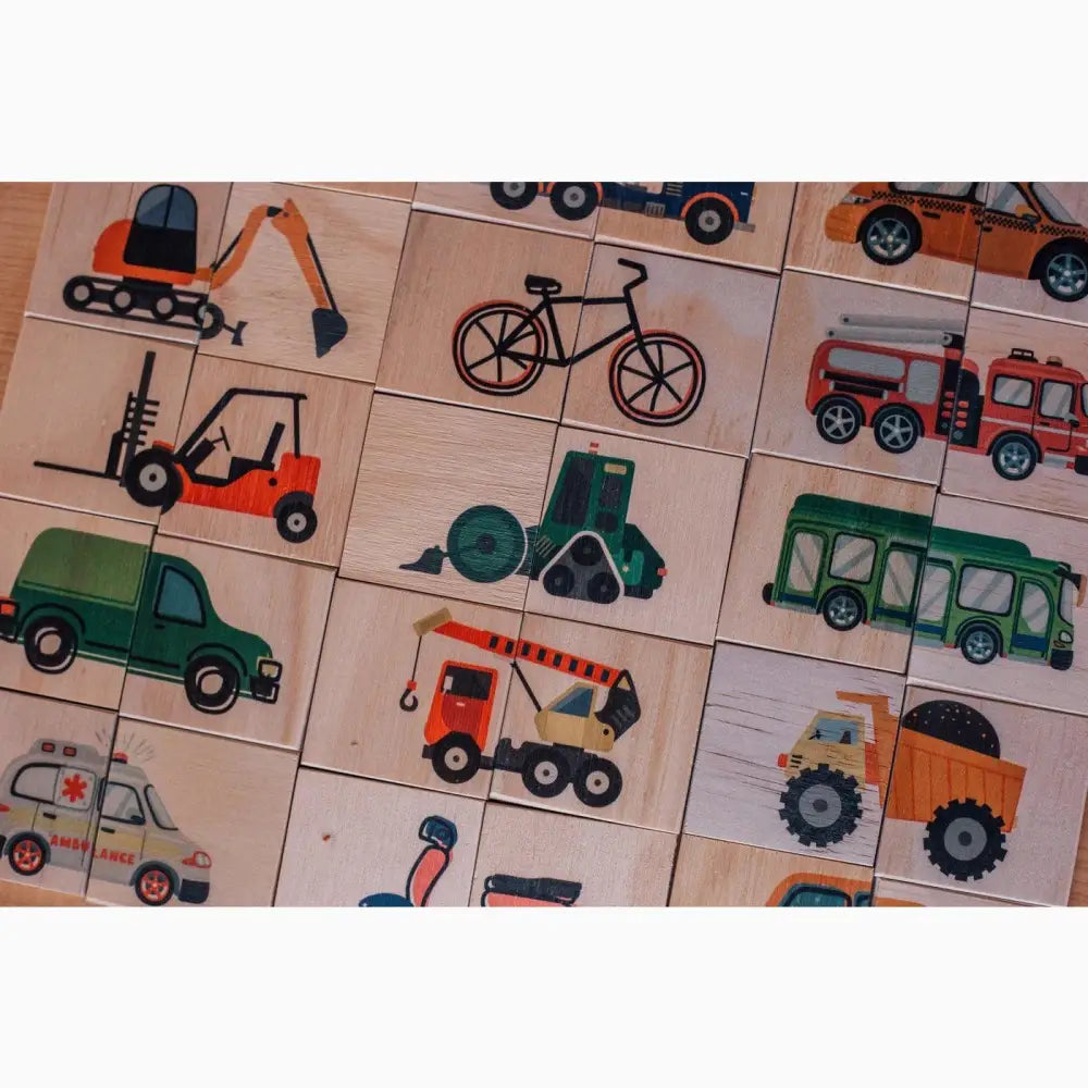 Wooden puzzle featuring various vehicle illustrations on separate tiles.