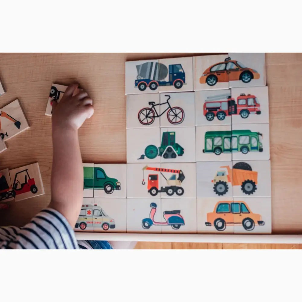 Wooden puzzle featuring colorful illustrations of various vehicles and modes of transportation.