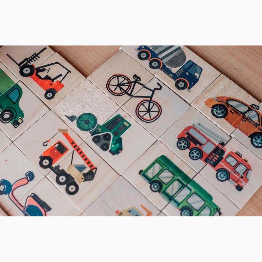 Collection of wooden puzzle pieces featuring various vehicle illustrations.