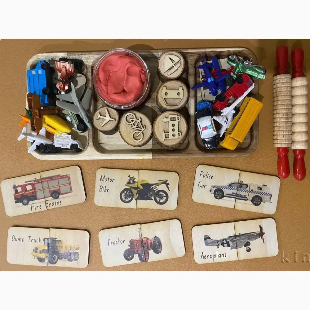 Collection of children’s toys and educational materials focused on vehicles and tools.