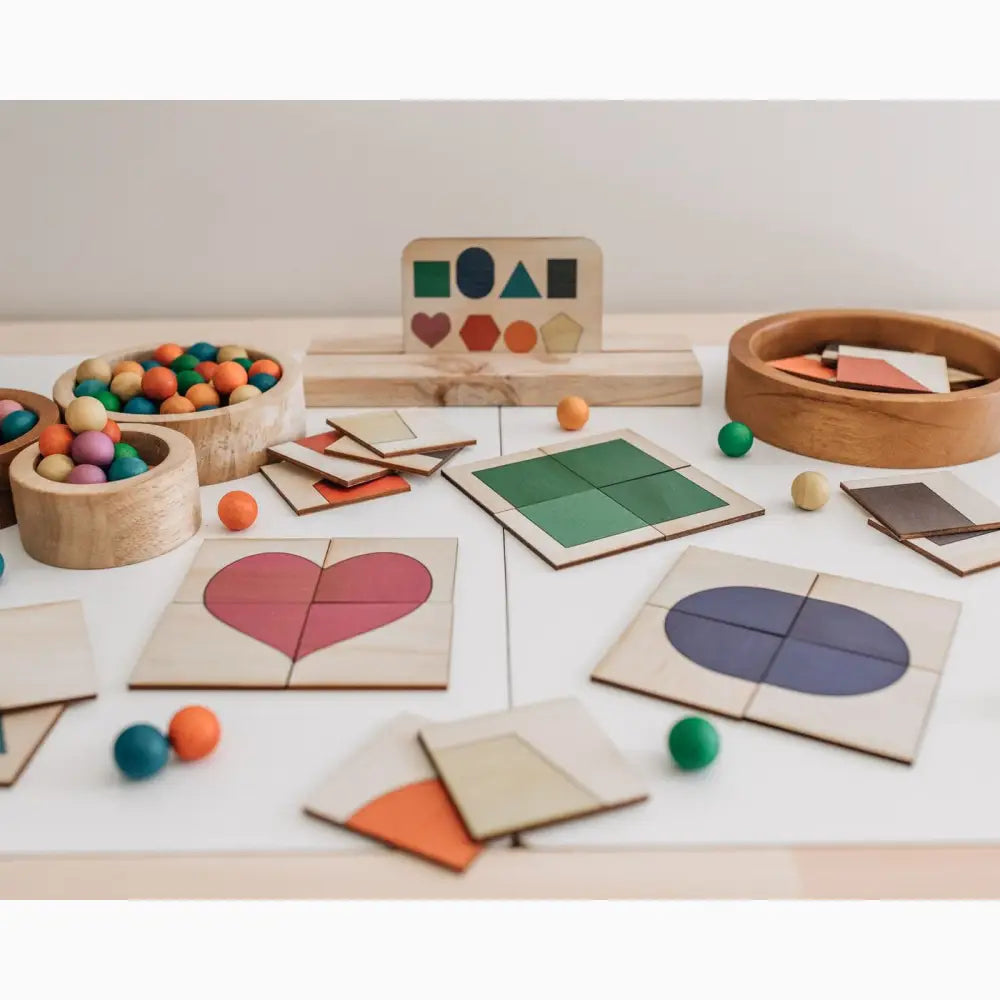 Wooden educational toys featuring geometric shapes, puzzles, and colorful balls.