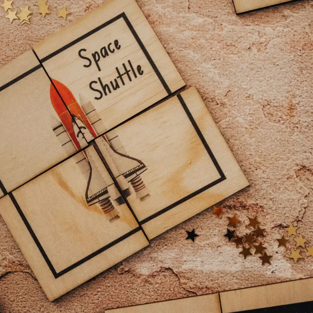 Wooden puzzle piece depicting a space shuttle with ’Space Shuttle’ text.
