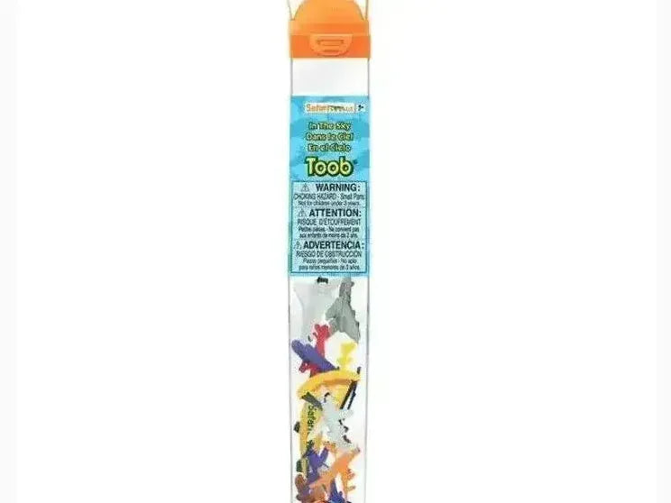 Transparent tube containing colorful plastic toy dinosaur figures with an orange cap.