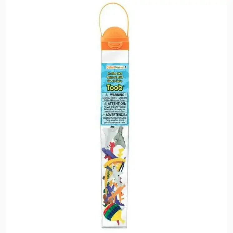 Transparent tube containing colorful plastic toy dinosaur figures with an orange cap.