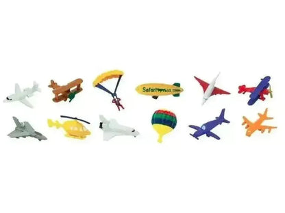 Collection of miniature toy aircraft and flying objects including planes, helicopters, a hot air balloon, and a parachute.