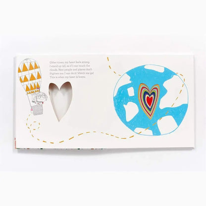 Open book or magazine spread with illustrations including a heart shape and a globe-like circle.